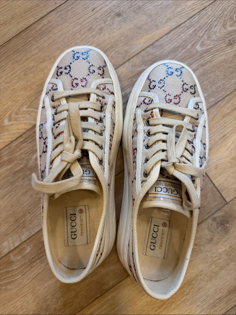 Gucci beige sneakers with blue and purple GG’s that sparkle. Women 9